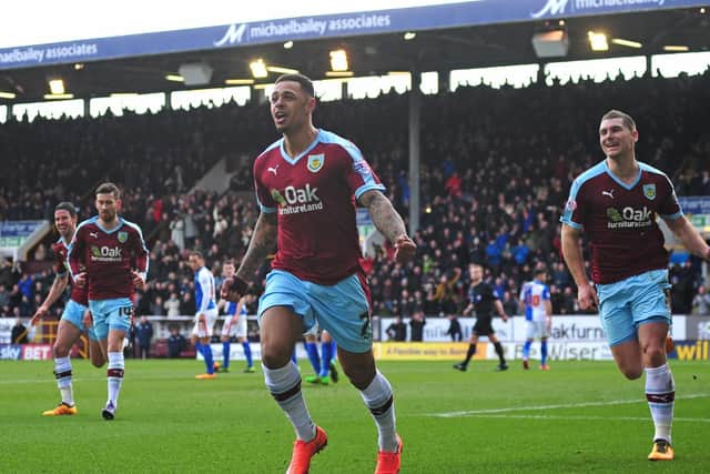 Andre Gray celebrates putting the Clarets ahead