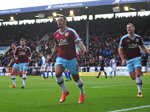 Andre Gray celebrates putting the Clarets ahead