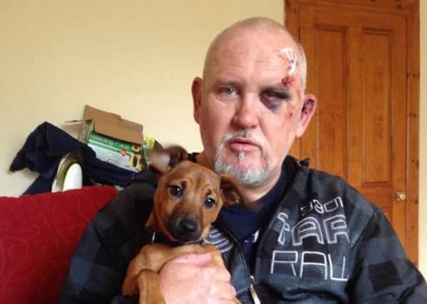 David Dann with puppy Peanut, who both escaped a horrific crash on the M6 near Lancaster.
