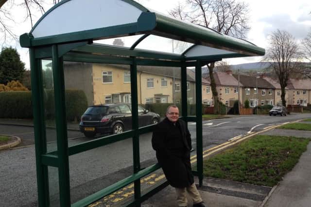 Coun. Joe Cooney at a bus stop in Ruskin Avenue, Colne, served by the No. 95/95A service. (S)
