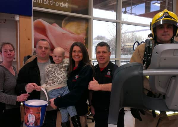 Tia Taggart with parents Lee and Gill, firefighters Chritian Lopez and Darren Bowers, as well as friend Leanne Barnes