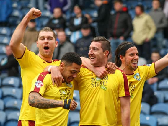 Sam Vokes, Andre Gray and George Boyd celebrate with goalscorer Stephen Ward
