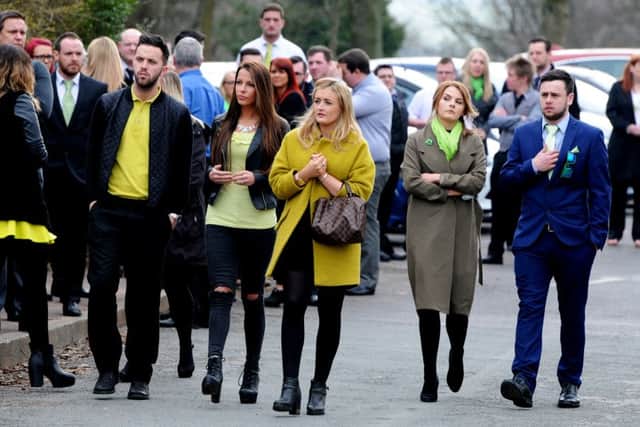 Funeral of Reedley man Ben King, who has died of cancer, at Burnley Crematorium.  Mr King raised Â£12,000 for brain and kidney disease after his diagnosis. People were invited to wear an item of lime green which was his favourite colour and his dog Bubba lead the coffin into the crematorium. Picture by Paul Heyes, Saturday March 12, 2016.