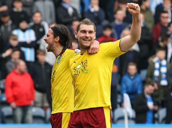 Sam Vokes celebrates his goal at Huddersfield last weekend with George Boyd.
