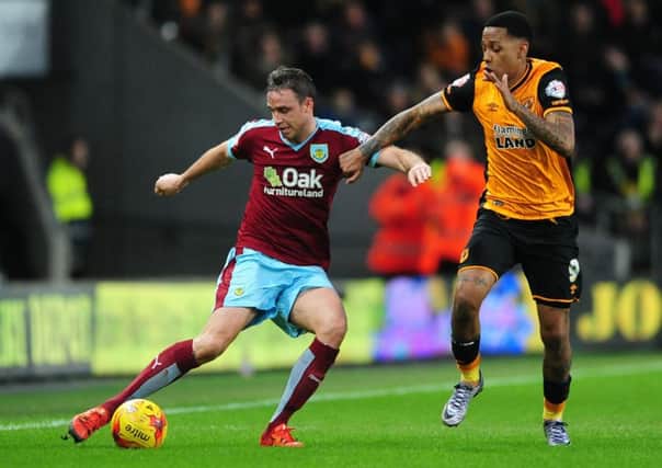Michael Duff vies for possession with Hull City's Abel Hernandez in his last outing