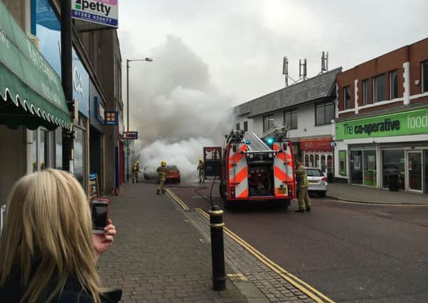 Car on fire in Market Street, Colne