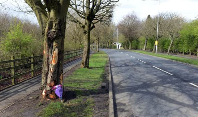 Tributes left at the scene where a 16-year-old boy has died after the car he was driving left the road and hit a tree. The teenager was driving a blue BMW 318 SE in Burnley, Lancashire, when he tried to overtake another vehicle and lost control, police said. He suffered multiple injuries in the crash in Ridge Avenue at about 9.40pm on Thursday and died later at the Royal Blackburn hospital. 8 April 2016.
