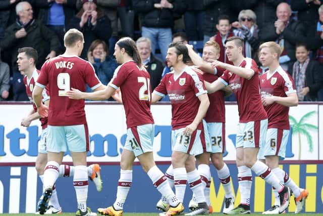 Scott Arfield is surrounded by his team-mates following his early goal