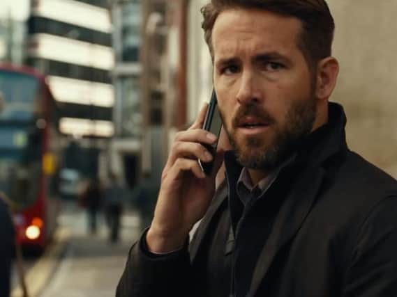 Ryan Reynolds as CIA operative Bill Pope. Photo: YouTube