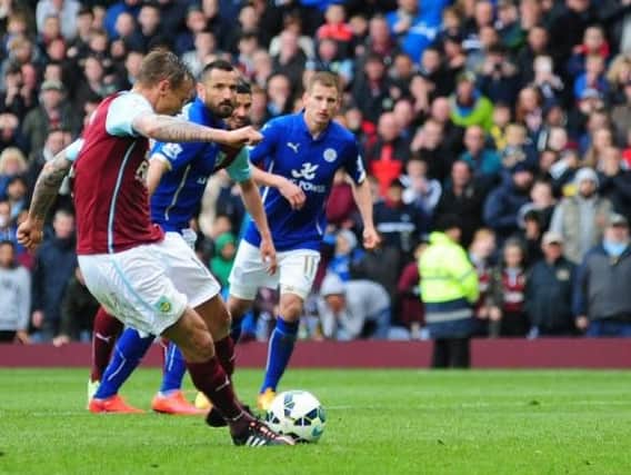 Matt Taylor misses a key penalty for Burnley against Leicester last April