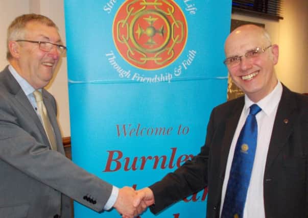 Burnley President Michael Jones (on the left) is being congratulated by the Provincial President, Robert Thompson (s)