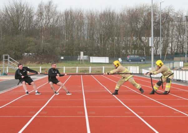 Firefighters will go toe to toe with members of the public during a charity endurance challenge. (S)