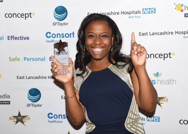Kanwa Ekwegh with her Rising Star award from the East Lancashire Health Trust (s)