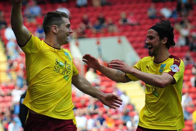 Sam Vokes celebrates opening the scoring with George Boyd