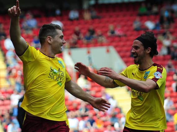Sam Vokes celebrates opening the scoring with George Boyd