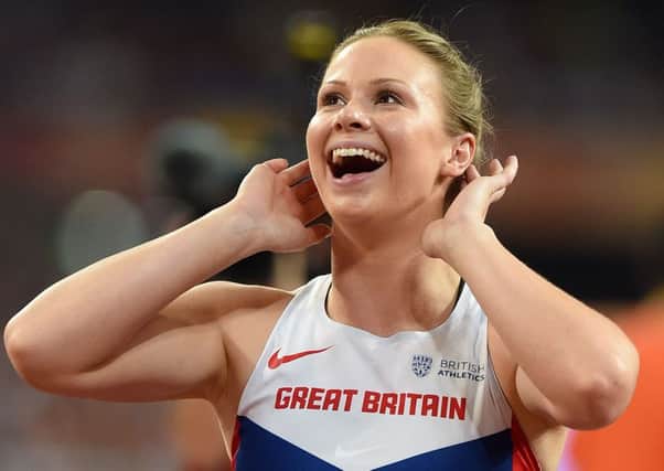 Great Britain's Sophie Hitchon smiles after her throw in the Women's Hammer Throw final during day six of the IAAF World Championships at the Beijing National Stadium, China. PRESS ASSOCIATION Photo. Picture date: Thursday August 27, 2015. See PA story ATHLETICS World. Photo credit should read: Martin Rickett/PA Wire. RESTRICTIONS: Editorial use only. No transmission of sound or moving images and no video simulation. Call 44 (0)1158 447447 for further information