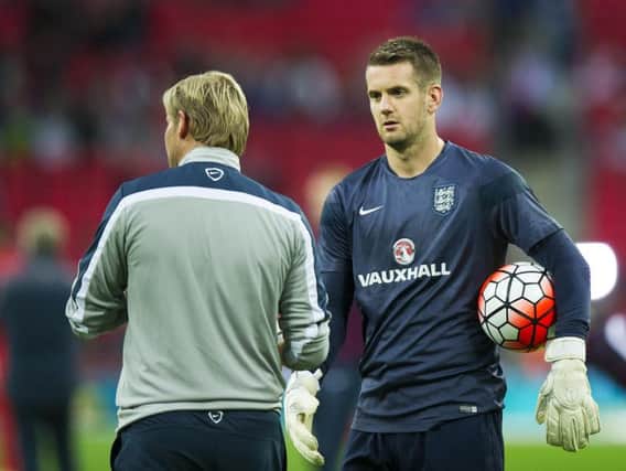 Tom Heaton warms up before England's Euro 2016 qualifying game with Switzerland at Wembley