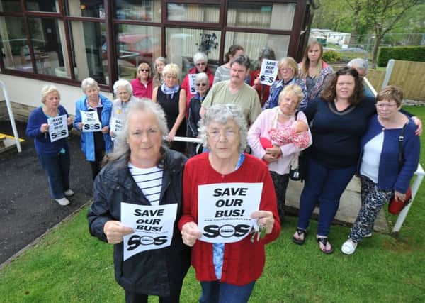 Photo Neil Cross
Margaret Hunt and her daughter Christine Taylor with Sabden sheltered accommodation residents are devastated that their only bus service to the village has been axed