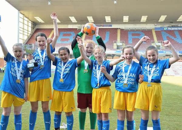 Padiham Primary School girls' footy team celebrate winning the Burnley Schools Girls' district football competition (s)