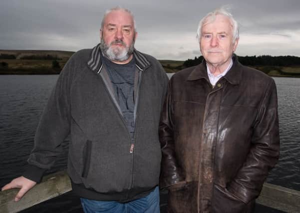 Leonard Burnett and James Blackburn from the Nelson Angling Association at Lower Coldwell Reservoir.