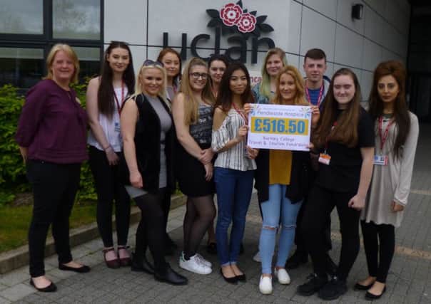 Travel students help the hospice