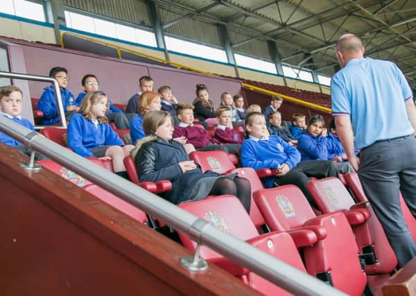 Ten primary schools from Burnley and Pendle were invited to Turf Moor for a literacy programme specifically designed to improve the writing of thousands of children, organised by Pobble and Burnley FC in the Community. (S)