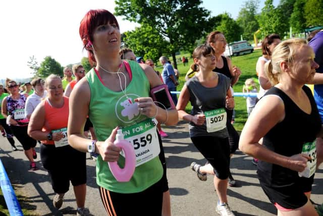 The annual Burnley charity 10k race attracted more than 2,000 runners who braved the warm weather to run the race which started and finished at Towneley Hall. Picture by Paul Heyes