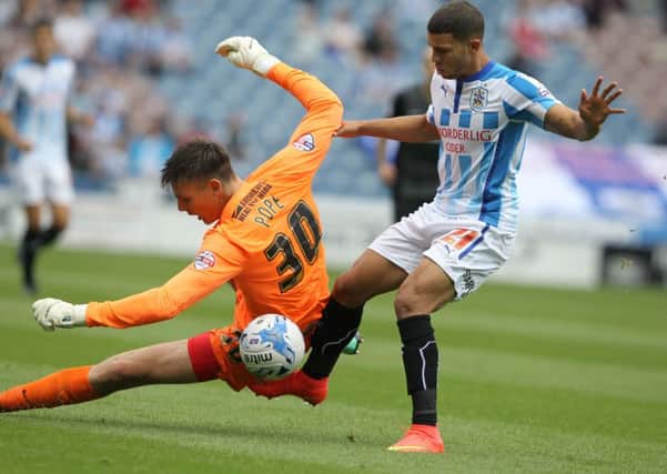Nick Pope in action for Charlton Athletic against Huddersfield Town