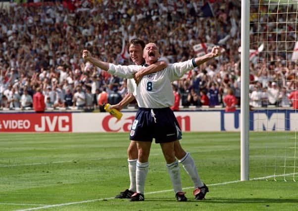 Paul Gascoigne celebrating his goal with Teddy Sheringham in the Euro 96 clash against Scotland, at Wembley.  Photo: Neil Munns/PA Wire.