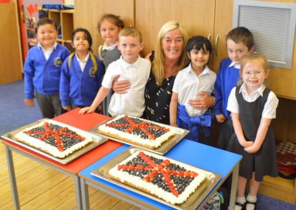 Staff and pupils at Heasandford wished the Queen a happy 90th birthday. (S)