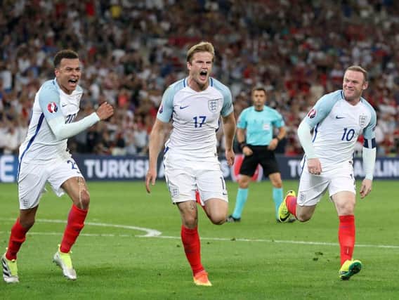 England's Eric Dier (centre) celebrates scoring their first goal of the game during the UEFA Euro 2016, Group B match at the Stade Velodrome, Marseille