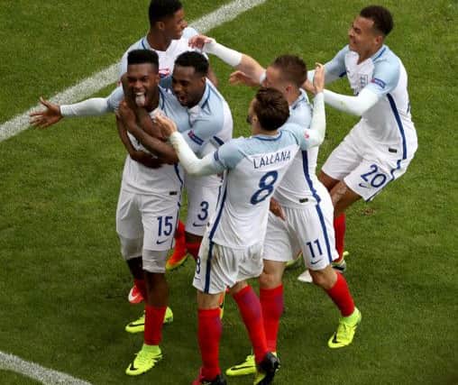 England's Daniel Sturridge celebrates scoring his side's second goal against Wales
