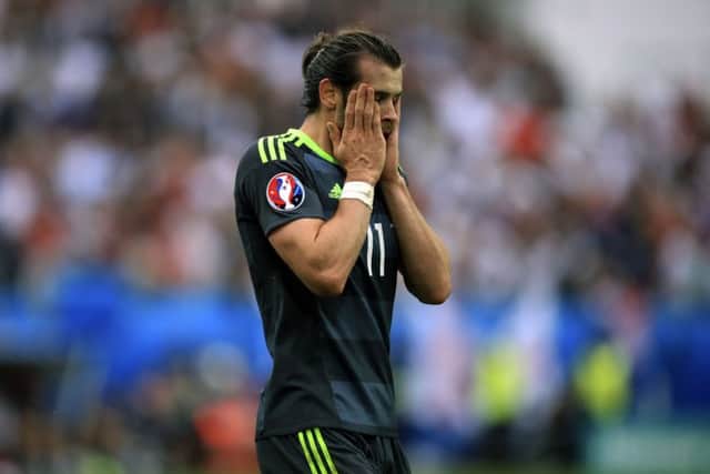 Wales' Gareth Bale is dejected at the final whistle