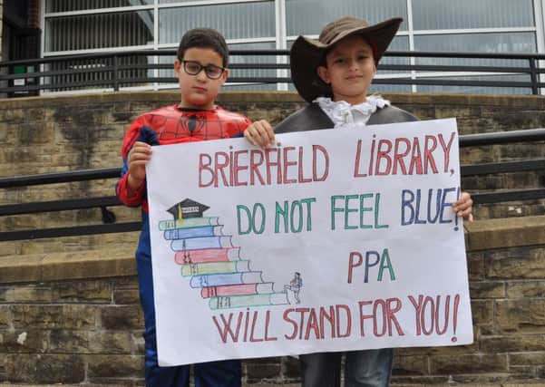 Pendle Primary Academy pupils dressed as their favourite book characters to protest against the proposed closure of Brierfield Library. (S)
