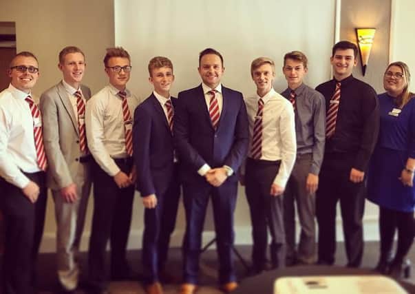 Growth: Chorley Group sales director Adam Turner (centre) with some of the new recruits