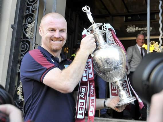 Sean Dyche lifted the Championship trophy last season