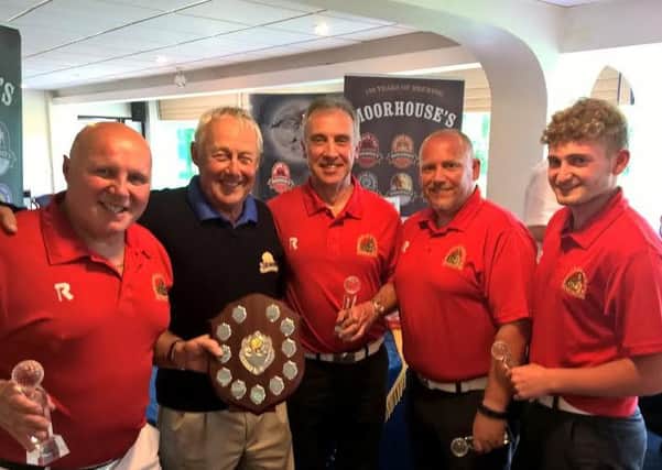 Winners of the Moorhouse's Brewery golf competition at Clitheroe Golf Club who are  M. Anderson, J. Wright, P. Wright and Tony Wiaczek, representing the Roggerham Gate pub, receive their shield and trophies from Moorhouse's chairman Bill Parkinson (s)