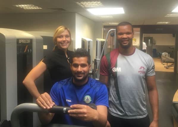 Padiham Leisure Centre supervisor Dianne Boyle with Ravi (centre) and Brady in the fitness room at the leisure centre