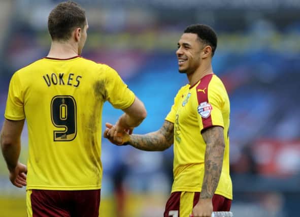 Burnley's Sam Vokes (left) and Andre Gray celebrate. Photo: Richard Sellers/PA Wire.