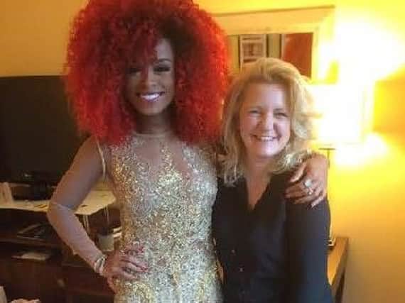 EVA finalist Jenna Barnes with singer Fleur East in the dress Jenna designed for her to wear to the Brit Awards