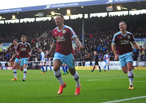 Andre Gray celebrates his goal against Blackburn in March