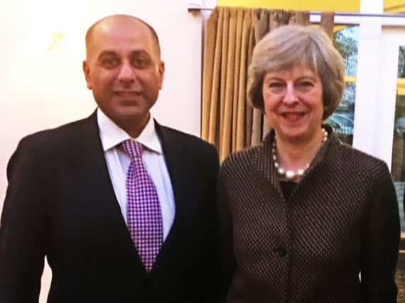 MEP Sajjad Karim with the new Prime Minister Theresa May.