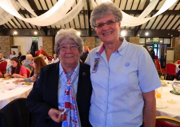Dorothy Bullock (left) with Christine Duckworth, County President for Lancashire East, as both receive their awards for 50 years service to Girl Guiding UK (s)