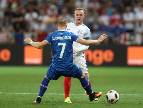 Johann Berg Gudmundsson closes down Wayne Rooney at Euro 2016