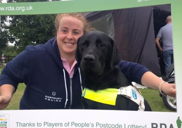 Vicky Howarth and guide dog Albie