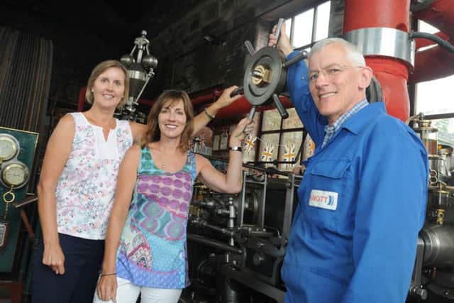 BURNLEY/NELSON   02-08-16
The great-great granddaughters of James Nutter, the founder of Bancroft Mill, Barnoldswick, Judith De La Cour from Jersey, left, and Janet Paterson from Australia, they made a special trip to start off the engine with a group of visitors watching on, also pictured is Tony Nixon from the mill, right.