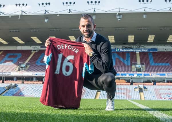 Steven Defour has signed in at Turf Moor