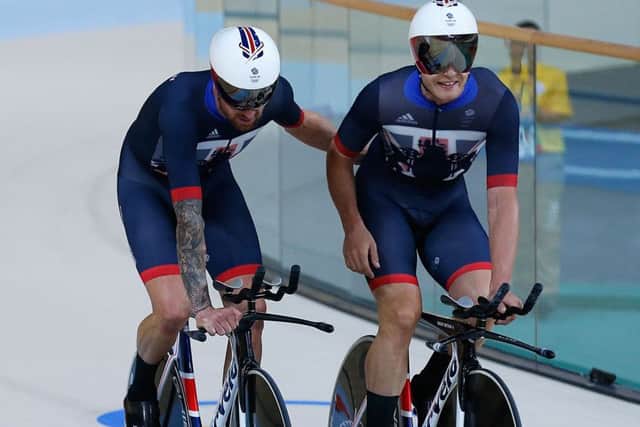 Sir Bradley Wiggins (left) and Steven Burke celebrate after the Great Britain team win gold in the Men's Team Pursuit First Final on the seventh day of the Rio Olympic Games. David Davies/PA Wire