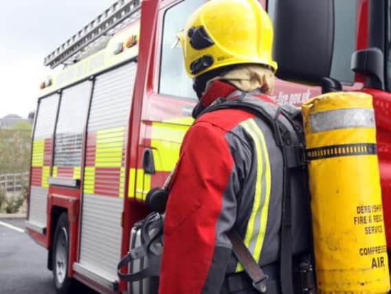 Firefighters tackle kitchen fire