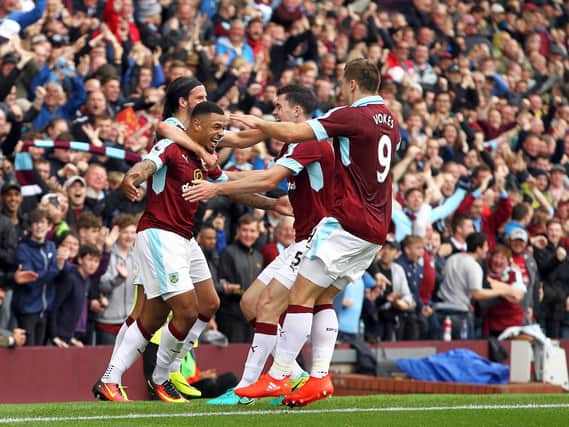 Burnley players help Andre Gray celebrate his goal